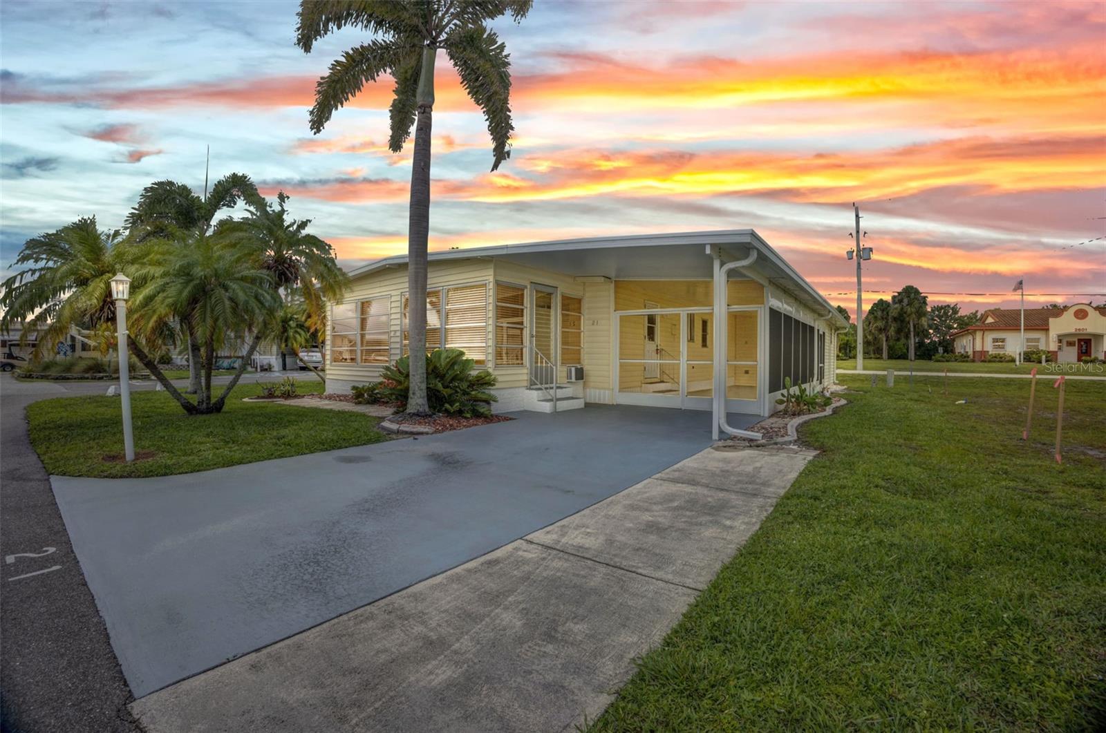 UPDATED mobile home on a CORNER LOT with NEWER THERMOPLASTIC ROOF for your peace of mind! Located in the popular River Haven Community, a 55+ across the street from the Burnt Store Publix shopping center including Home Depot, Publix, Pet Superstore, Shipping Store and so much more! VERY CONVENIENT TO ALL AMENITIES including Walmart and just minutes to the 1-75 exit so you can get where you need to go quickly. This home features an updated kitchen with a huge pantry! The dining room is open to the living room and there's a HUGE FLORIDA ROOM with a new window A/C unit. FURNITURE is OPTIONAL AND ALL APPLIANCES ARE INCLUDED. 2 full beds and 2 full baths. ESCAPE TO YOUR OWN WINTER RETREAT WITH THIS AFFORDABLE HOME! Large outside screened lanai with 1 - car carport with plenty of room for your golf cart as well and large storage shed! THE LAUNDRY ROOM IS INSIDE FOR YOUR CONVENIENCE. River Haven is one of the prettiest parks in the area AND HAD NO FLOODING DURING ANY OF THE STORMS. The community offers their residents a host of amenities including a HEATED AND CAGED COMMUNITY POOL, clubhouse, marina with docks, park area, shuffleboard courts, and a boat storage area. Just a short drive from Historic Downtown Punta Gorda, where there are weekly farmer's markets, fine and casual dining including waterfront dining, miles of biking paths and FISHERMEN'S VILLAGE WATERFRONT MALL! There are many social events to keep you as engaged as you'd like to be. LOW HOA FEE IS ONLY $250/MO AND INCLUDES LAWN MOWING WATER & SEWER! With low fees and a welcoming community atmosphere, now is the perfect time to secure your winter retreat! Buyer must be interviewed (in person or virtually) and approved by the Board. Land is resident-owned and requires a 10-share purchase for $10,000 WHICH IS REFUNDABLE WHEN YOU SELL. Call today for a private showing and community tour!