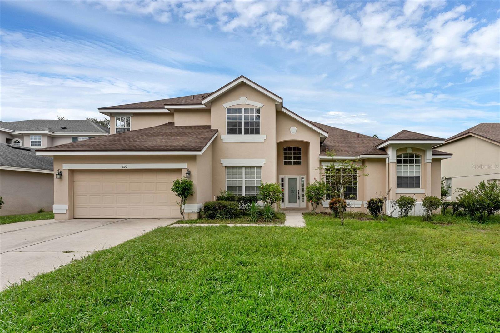 PRIME LOCATION!! Welcome HOME to this Upgraded and Spacious 4-Bedroom, 3-Full Bathroom, & 2-Half Bathroom Oasis with a Screened-In Private Pool boasting 3,222 of heated sqft in the heart of Oviedo at the highly sought-after Kingsbridge West community!! This property comes equipped with an oversized 2-Car Garage that has extra bonus space with a window for a golf cart, workshop or man cave area. The lot is huge and has a Fenced backyard, nearly a Quarter Acre equipped with Fruit/Herb Trees (Mango, Lime, Java Plum, Curry, Mint), giving you a sense of tropical paradise right in your backyard! New ROOF installed 2014, New toilets and faucets in 2016, Brand New Carpets in bedrooms, and a Freshly Painted Interior!! As soon as you turn into the driveway, you'll notice the charming curb appeal and therapeutic views of the Massive Pond with a Fountain directly across the street. Once you enter through the front door, you'll immediately notice the amazing flow of this floor plan with high vaulted ceilings, designer laminate flooring, natural lighting and an amazing view of the private screened in pool. The SPACIOUS Master Suite and En-Suite Master Bathroom is conveniently located Downstairs immediately to your right as you enter the property providing ample privacy from the other guest bedrooms through the split floor plan. This large Master Retreat has an extra attached room that could be used for a gym, nursery, private sitting room or office/study space with private access out to the pool. The first level also comes equipped with a half bathroom, Laundry room with Washer & Dryer included, Living room, formal Dining room, Breakfast Nook/Dinette area, and a Large Bonus Family Room. Explore your inner chef in the heart of the home in the spacious and upgraded kitchen equipped with 2 Walk-In Pantries, Granite countertops with a Breakfast Bar, plenty of wood cabinets for Storage Space, Tiled backsplash, and Stainless Steel appliances. The 3 additional guest bedrooms share 2 full bathrooms upstairs in addition to a nice loft area. Step out through the glass sliding doors to read and enjoy a cup of coffee/tea under the shaded lanai while enjoying the tropical vibes of the private pool and fruit/herb trees in your fenced backyard. There is also an additional enclosed 1/2 bathroom outside as a bonus for guest use, an ideal floor plan and ambiance for hosting/entertaining family and friends. The community is conveniently located near plenty of shopping, dining, and entertainment options, including an exclusive back entrance to Oviedo on the Park, where you will find A-rated schools, restaurants/food trucks, a fitness center, dog park, coffee and ice cream shops, a bakery, a park and splash pad, dog park, community center, an open-air theatre, a long lake with fishing dock and kayak launch, and much more! Villages at Kingsbridge West is in the perfect location for families, as it is a quick walk to Stenstrom Elementary and just a few miles from UCF, plus anything from Pre-K to Doctorate Degree within just minutes of the home, plus has 2 tennis courts and a playground! Also close access near SR-434 and SR-417, Oviedo Aquatic Center & Gym, and the Seminole County Trail! Don’t miss this rare opportunity to own a slice of paradise to not just Upgrade your Living, but also your Lifestyle with all that Kingsbridge West and Oviedo has to offer! Schedule your private tour Today to make this beauty YOURS!!