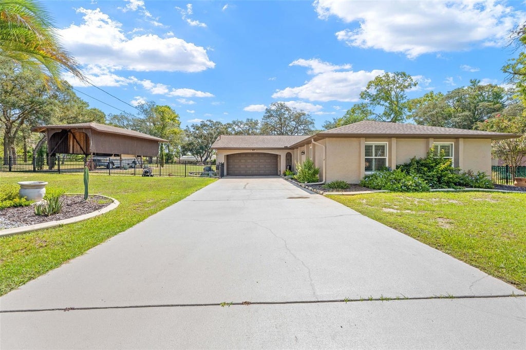 Photo of 11238 Kodiak Wren Road, Weeki Wachee, FL 34614 (MLS # W7888612)