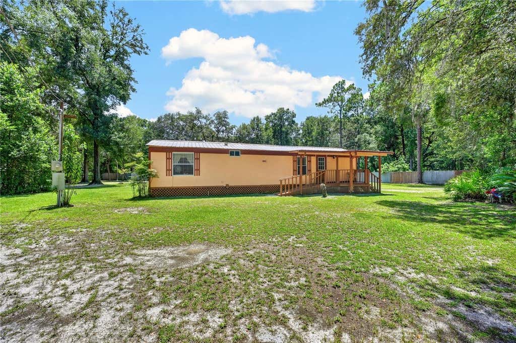 Photo of 8200 SE 145 Street, Dunnellon, FL 34432 (MLS # OM730129)