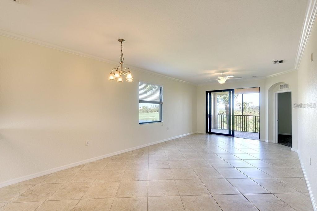 Photo of 6509 Grand Estuary Trail #201, Bradenton, FL 34212 (MLS # A4655418)