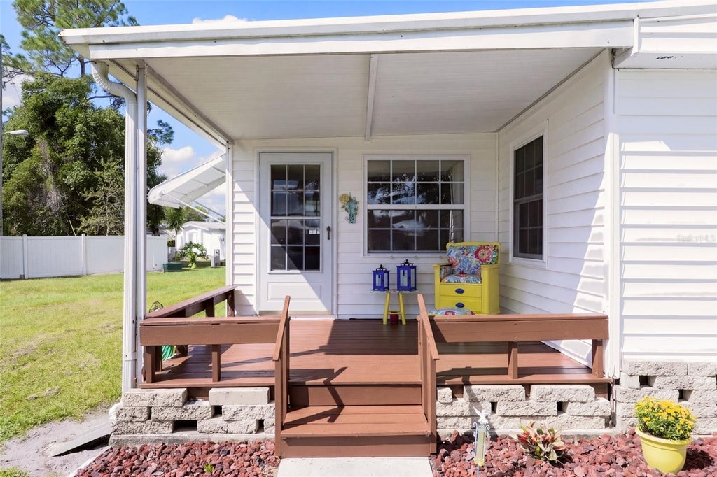 Photo of 914 Blue Heron Boulevard, Osteen, FL 32764 (MLS # O6451534)
