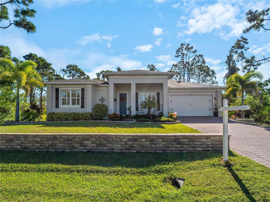 Photo of 8228 Walbert Street, Port Charlotte, FL 33981 (MLS # A4669309)