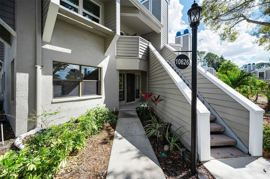 Photo of 10626 Longwood Drive #102, Seminole, FL 33777 (MLS # TB8484356)