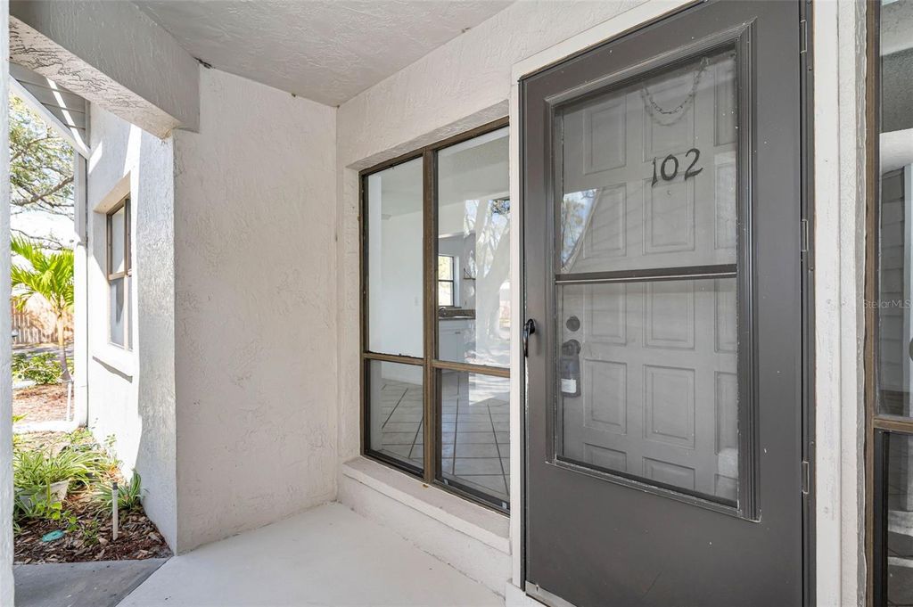 Photo of 10626 Longwood Drive #102, Seminole, FL 33777 (MLS # TB8484356)