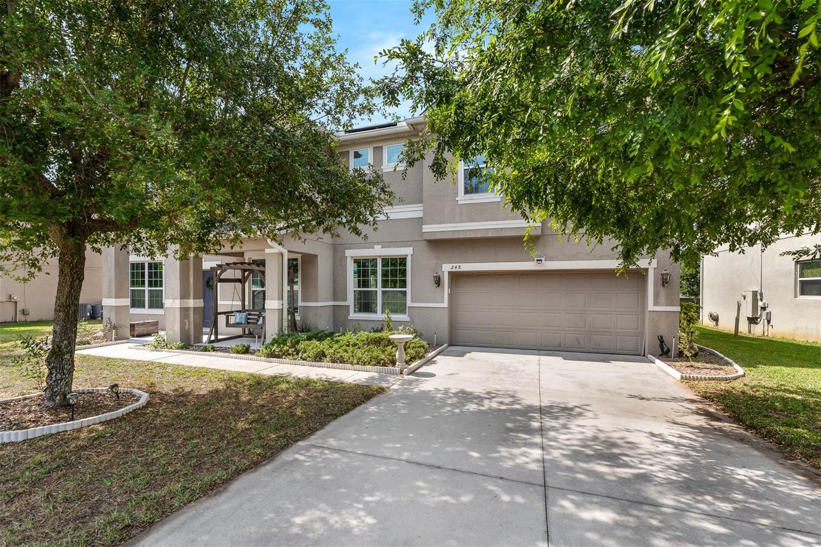Get busy living in this over 4,000 sq. ft. beautifully designed 5-bedroom, 4-bath home located in the desirable Forestbrooke community of Ocoee. The floor plan gives you the best blend of formal and casual, open concept living. The soaring entryway, formal living and dining rooms lead to the eat-in kitchen & family room combo that is perfect for entertaining. Need a dedicated office/study?... you got it! Want a theater/media room for movie nights, man-cave or she-shed?...you got it! In addition, a generous loft/flex space ideal for a playroom, gym, or second living area. NEW ROOF & Solar Panels 2022/2023 (No electric bill); NEW HVAC 2023/2024. Forestbrooke offers a gated entrance, community pool, and playground, all just minutes from vibrant Downtown Winter Garden and the scenic West Orange Trail. This is the perfect blend of luxury, space, and location—don’t miss your chance to call it home!