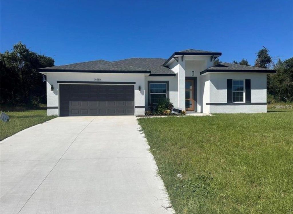 Photo of 15889 SW 58th Terrace, Ocala, FL 34473 (MLS # O6404381)