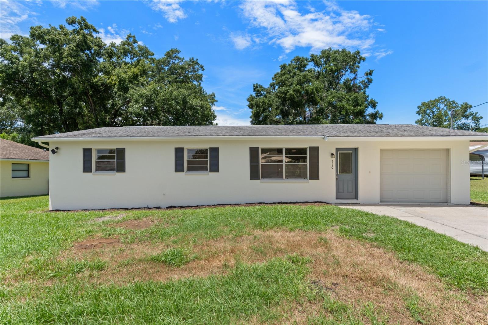 Welcome to 719 S Apopka Ave – where comfort meets convenience! This charming, move-in-ready gem sits on an expansive ~quarter-acre lot. Inside, you're greeted by 3 roomy bedrooms and 2 full bathrooms featuring tiled showers. The freshly painted interior and exterior along with sleek luxury vinyl flooring throughout create a warm and inviting ambiance. Step outside to enjoy the spacious screened porch, perfect for relaxing afternoons, and an extended secondary uncovered patio area for extra leisure space. Plus, a versatile shed perfect for a DIY enthusiast or for meeting all your extra storage needs. Nestled near downtown Inverness, you’ll be just a short drive away from shopping, dining, and entertainment. The home was recently appraised at $ 200,000. Your perfect place to call home awaits!