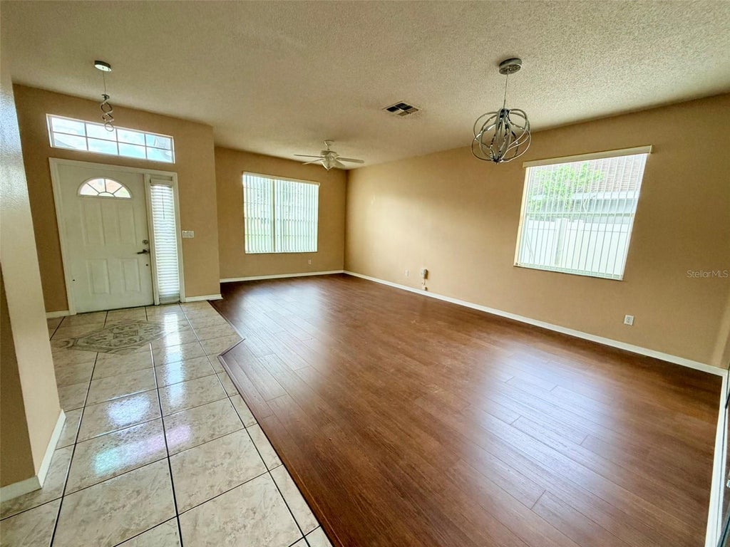 Photo of 847 Whispering Cypress Lane, Orlando, FL 32824 (MLS # O6416505)