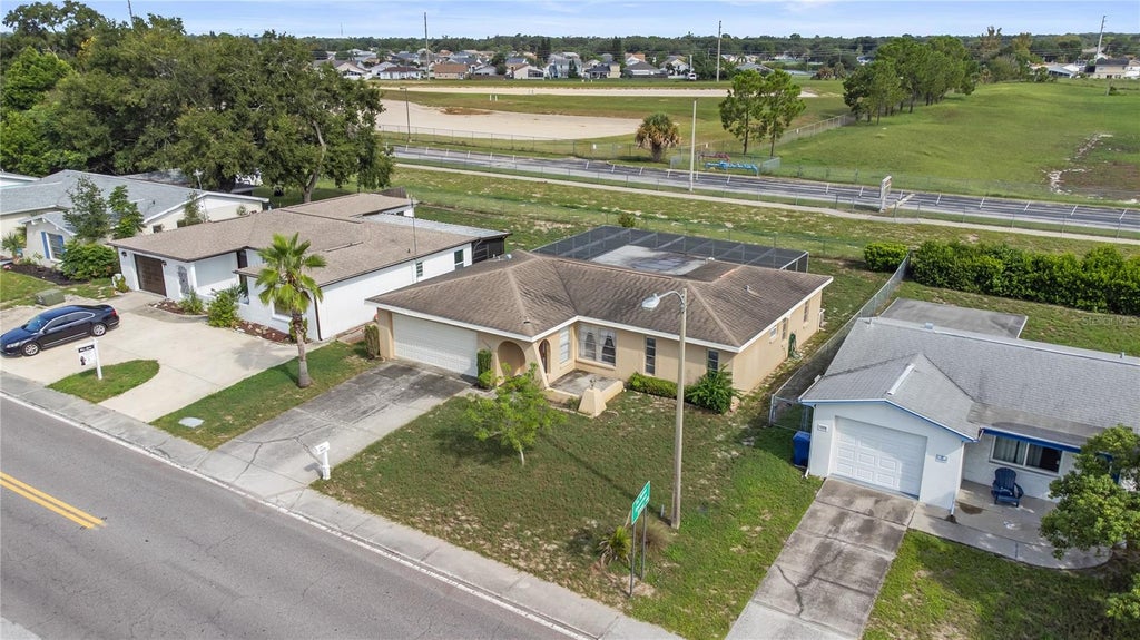 Photo of 8351 Fox Hollow Drive, Port Richey, FL 34668 (MLS # TB8546913)