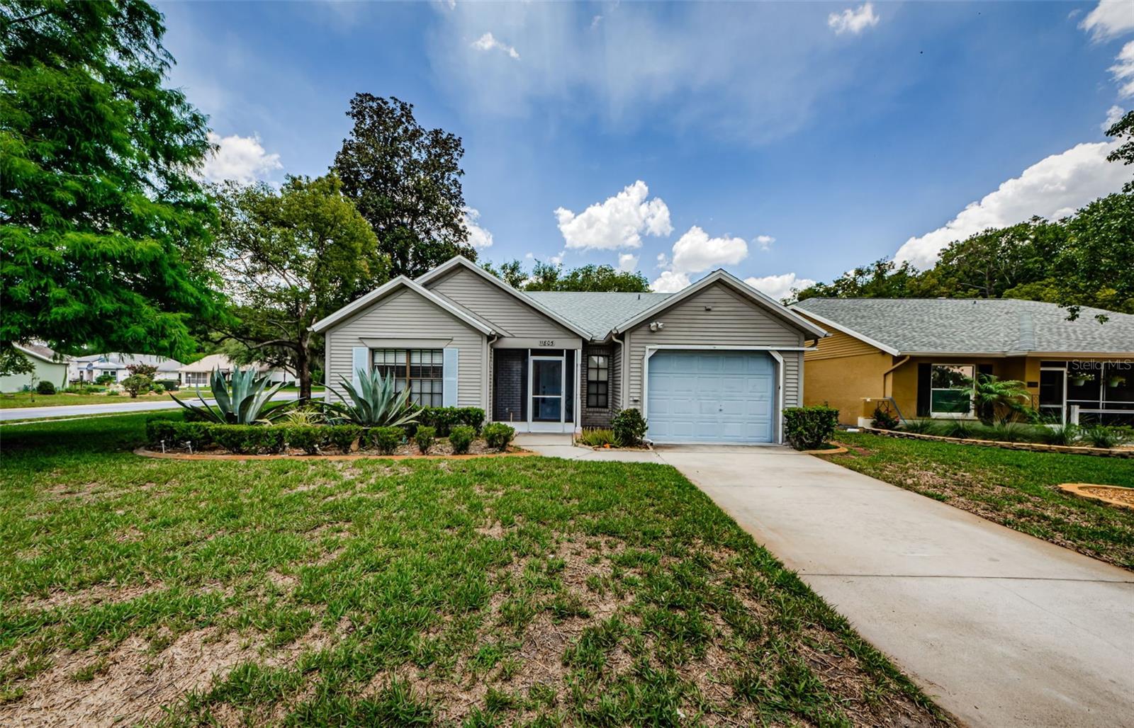 Welcome to carefree Florida living in this move-in ready 2-bedroom, 2-bath, 2 car garage located in the highly sought-after 55+ gated community of Summertree. With a brand-new roof and AC, this move-in ready home offers a spacious layout with a bright Florida room, and a screened porch both overlooking tranquil pond views. The heated and cooled Florida room (not included in public square footage) offers extra living space for entertaining. Large living and dining areas with high ceilings, and split-bedroom design provide both comfort and functionality. The spacious eat-in kitchen offers plenty of cabinetry and counter space. Summertree is truly resort-style living at its best. The newly renovated clubhouse is state-of-the-art, offering a billiard room, computer room, library, arts & crafts studio, and a stage for concerts, dances, and community events. Residents enjoy a gorgeous heated pool, jacuzzi, and fitness center — a vibrant hub for meeting new friends. Outdoor enthusiasts will love the tennis courts, pickleball, bocce, shuffleboard, horseshoes, and the beautifully maintained 9-hole golf course, which is golf-cart friendly and surrounded by natural scenery. Arborwood also offers an additional private pool.At Summertree, the HOA takes care of cable, internet, lawn care, and exterior painting — so you can spend your days enjoying the resort-style amenities. Residents love the clubhouse with its media room, card room, library, and auditorium hosting dances, bingo, comedy shows, and more. Stay active with the fitness center, heated pool, spa, tennis, pickleball, bocce ball, shuffleboard, and horseshoes — or perfect your swing on the community golf course. This home combines low-maintenance living with a vibrant, social community and is located close to shopping, dining, medical facilities, and Gulf Coast beaches. Truly the best of Florida living!