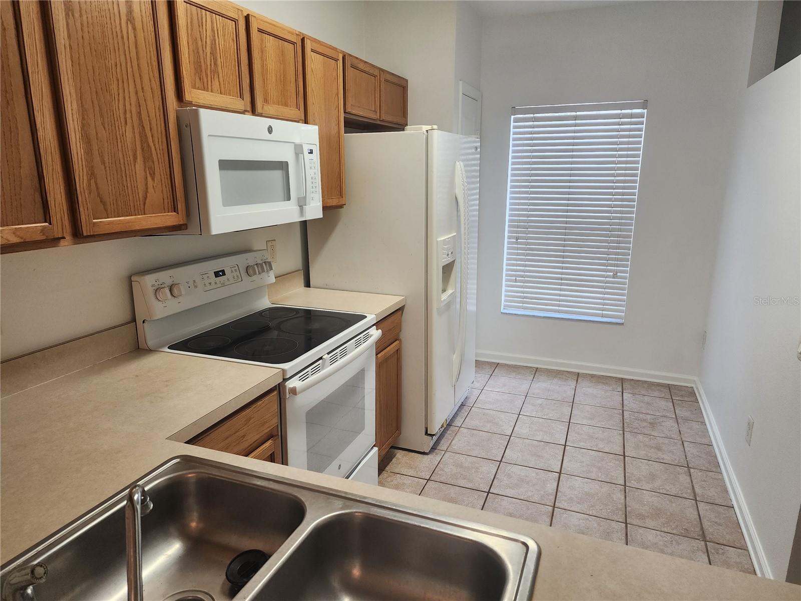 Look at this nice 2 bedroom townhouse for rent in Sanford. Close to lots of shopping and convenient to everything in Central Florida this unit is move in ready and spacious. Large living area and kitchen are downstairs. Wood laminate flooring, tile, and new paint, well equipped kitchen, this unit has both bedrooms upstairs each with a full bath. There is a half bath downstairs for the guests. Even has a nice screen porch with storage. All in a well managed gated community. Call today!!