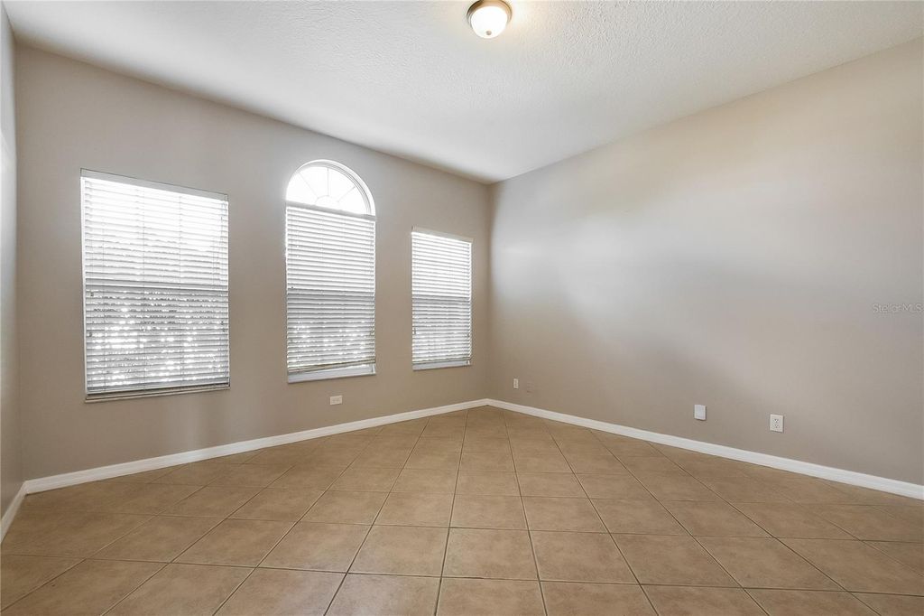 Photo of 9654 Worthington Ridge Road, Orlando, FL 32829 (MLS # TB8443843)