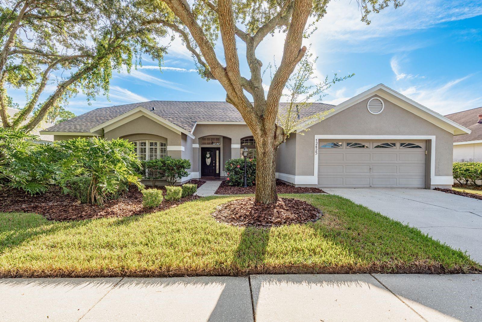 Experience the best of Westchase living in this elegant 3-way split floor plan 5-bedroom, 3-bathroom residence. Thoughtfully designed for both comfort and sophistication, the home features an oversized Pepple Tec salt chlorinated pool and rear super-sized screened lanai and child safety fence for fun Florida entertaining, custom primary closet, garden tub, FULL size wine refrigerator, high-end lighting, and a series of recent upgrades including a state-of-the-art DAIKIN Variable speed 17 SEER HVAC system, new dishwasher, and new washer and dryer. 30-year dimensional roof 2018. There are 4 mounted TV's included in the sale, one in the living room, one in the family room and two on the back lanai. Just a short stroll away, Glencliff Park offers tranquil trails and serene docks for fishing or relaxation. Families will also value the highly acclaimed Alonso High School, home to the prestigious International Baccalaureate program. Set in one of Tampa’s most celebrated communities, this home offers a rare combination of luxury, convenience, and lifestyle.
Westchase is easily considered to be on one of the most prestigious suburbs in all of Tampa Bay and was ranked by Niche.com as the number one best suburb in all of Florida in August 2023 and ranked number one in Tampa Bay in 2025. 1 Westchase community amenities include resort style pools, tennis courts, pickle ball courts, splash park, ping pong tables, playgrounds, basketball courts, pavilions, outdoor fitness equipment, and miles of walking paths, bridges and ponds to discover.