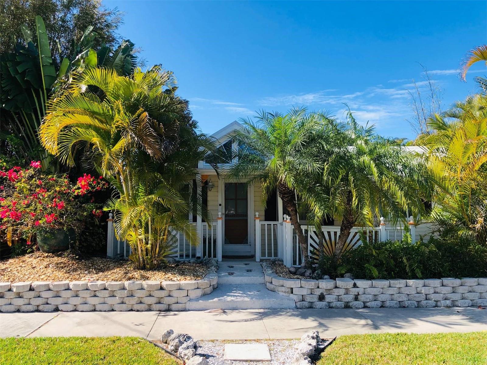 Newly remodeled bungalow blocks from Whitney Beach & a block from bay. Historic home was once a post office in the 1920's. Open layout w/high ceilings, stainless appliances w/ gas stove. Heated swimming pool & hot tub. Relax & listen to breezy palms smack up against each other in this gorgeous landscaping! Sleep tight in a quiet neighborhood that allows zero public parking. Very serene, private fenced-in property - what happens here, stays here! Boat parking & convenient to public water access. Walk to Mar Vista, or join the fun in St. Armand's. Available furnished, for a 28 day minimum, sleeps 6 in king/king with 2 closets in each room & a cozy queen sofa.