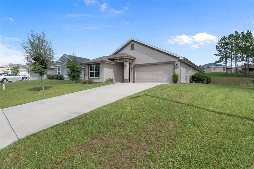 Forget having to wait on your brand new home to be completed!! This 2021 Adams Built Home sits on an smaller lot that is very easy to maintain! Get out and enjoy the Florida sun instead of working on home projects because this home is TURN KEY!! Open Floor Plan with High Ceilings throughout. Gorgeous wood like plank tile in the Wet Areas: Entryway, Dining Room, Kitchen, and Bathrooms. Split Bedroom Floor Plan to ensure privacy in the home. SPACIOUS Primary Bedroom with large bathroom and walk-in closet. Screened-in Linai Patio to enjoy those warm, Florida days. Separate Laundry Room. PLENTY of space between your side neighbors, as well as your rear neighbors! Property is High & Dry - NO Flood Zone! Public Water & Sewer. There is an annual HOA of $250 - THAT'S IT!! NO CDD Fees! Walk down the street to the local Public Library. Less than 2 minutes to Publix and Walgreenz. Downtown Ocala is less than 1 hour drive. Be in downtown Orlando in less than 1.5 hour. Crystal River is less than a 20 minute drive to enjoy different water activities. Rainbow River Springs State Park is a short drive of less than 30 minutes. If you're interested in Golf, Citrus Hills Golf Course is very close by. ASK ME ABOUT AN ASSUMABLE MORTGAGE AT 2.99%.