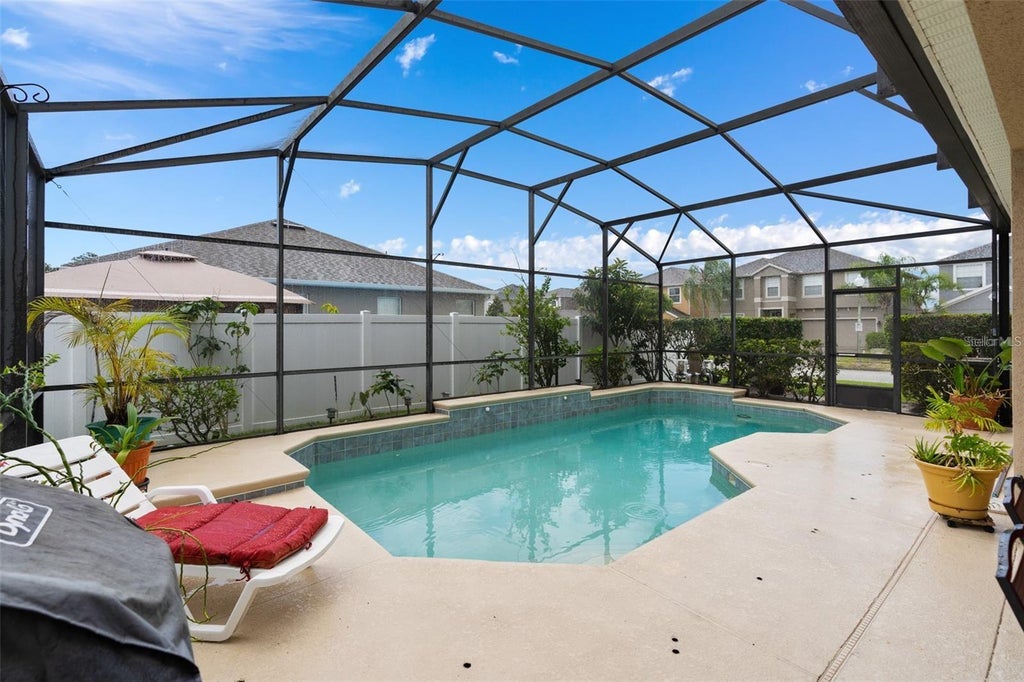 Photo of 5182 Walnut Ridge Drive, Orlando, FL 32829 (MLS # O6445850)