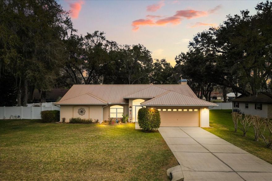 Beautiful ONE-OWNER home built in 2006 by Bill Branham where pride of ownership shines throughout. Enter in to this 3/2 POOL home with a open SPLIT FLOORPLAN that offers both comfort and privacy. This 3 BEDROOM, 2 BATH PLUS OFFICE IS highlighted by a GREAT ROOM with vaulted ceilings and a cozy wood-burning FIREPLACE that flows seamlessly into the breakfast dinette just off the kitchen. The kitchen showcases wood cabinetry, GRANITE countertops, STAINLESS STEEL appliances, and closet pantry, while a separate formal dining room provides space for special occasions. Inside LAUNDRY complete with wash sink, storage cabinets, and shelves make LAUNDRY a breeze. The spacious PRIMARY suite serves as a private retreat with French doors leading to the pool area, his and hers walk-in closets. PRIMARY BATH with dual vanity sinks, a relaxing garden tub, and a separate walk-in shower. Just off the welcoming foyer is a PRIVATE OFFICE with wood floors and its own door, perfect for working from home. Guest bedrooms are generously sized and each includes a WALK IN CLOSET. With no carpet throughout, thoughtful design, and exceptional outdoor living spaces.  This home offers comfort, functionality, and timeless appeal all in one. Situated on a spacious 1/3-ACRE LOT with mature trees, this WELL MAINTAINED property features a durable METAL roof and a fully fenced PRIVATE backyard designed for both relaxation and entertaining. Enjoy your own BACKYARD RETREAT with an INGROUND POOL- screen-enclosed and solar-heated. The OVERSIZED PATIO perfect for gatherings, and an additional patio area ideal for BBQs. Located in a well established neighborhood with **NO HOA**. BRING YOUR BOAT OR RV, double gates allow space to park in the backyard for privacy and security. Fantastic location only minutes to I-4, shopping and schools. Make your appointment to see today.