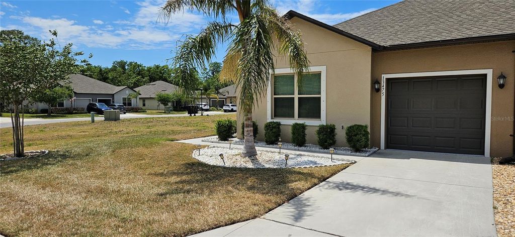 Photo of 13475 Crest Lake Drive, Hudson, FL 34669 (MLS # TB8501874)
