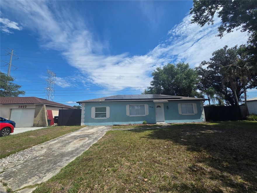 Beautifully renovated and thoughtfully upgraded, this exceptional three-bedroom, two-bath home in the desirable East Orlando community of Eastwood Terrace offers the perfect blend of comfort, style, and convenience. Nestled on a quiet cul-de-sac with no rear neighbors, this well-maintained single-story residence provides both privacy and a peaceful setting. Step inside to discover a bright and inviting interior featuring tile flooring throughout, fresh interior paint, and a functional split floor plan designed for modern living. The heart of the home is the stunning kitchen, showcasing upgraded real wood cabinetry, sleek granite countertops, and ample space for cooking and gathering. Both bathrooms have been fully remodeled with tasteful finishes, adding a touch of luxury to everyday living. Enjoy Florida living at its finest with a covered patio overlooking a spacious, fully fenced backyard—perfect for entertaining, relaxing, or pets at play. Major updates include a 2033 roof and fully paid-off solar panels, offering long-term energy savings and peace of mind. Conveniently located near Chickasaw Trail and Lee Vista Boulevard, this home provides quick access to major highways, shopping, dining, and is just minutes from Orlando International Airport. Families will appreciate the proximity to nearby schools, including Pinar Elementary, Liberty Middle, and Colonial High. With no HOA and a prime location that combines tranquility with accessibility, this move-in-ready gem is a rare find. Schedule your private showing today and experience all this home has to offer!