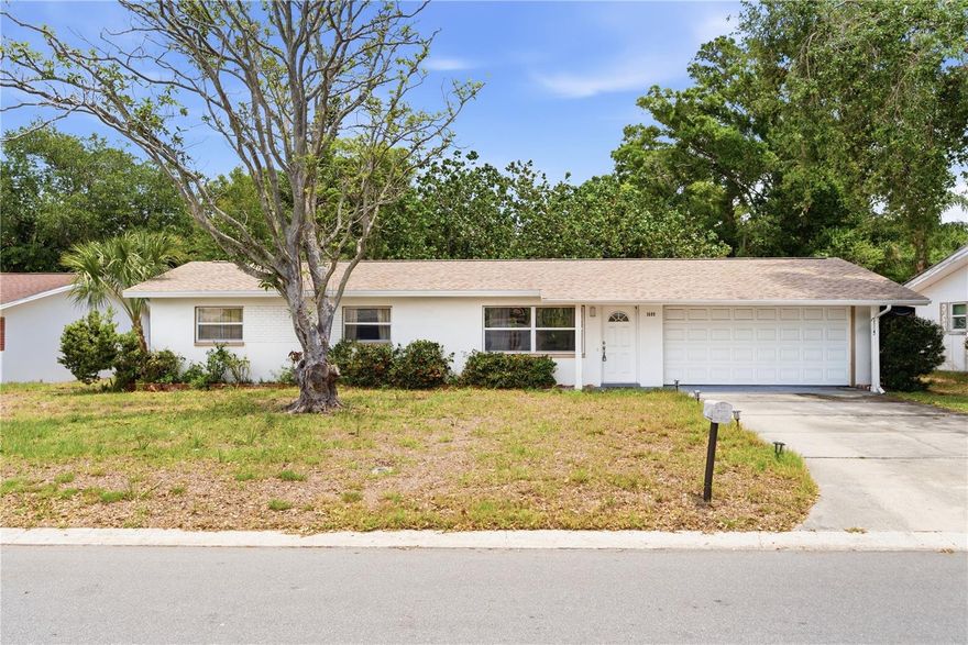 Very spacious 3 Bedroom, 2 bathroom house with open concept! Open living room and kitchen with a large Florida room. Enjoy the beautiful view of the lake in the back yard! The house was completely renovated in 2022 - beautifully updated kitchen and bathrooms! Refrigerator, dishwasher, stove, roof and new electric panel with a permit - all 2022. The AC unit 2023. The house is located in an unincorporated part of Clearwater. This has never been flooded, and is in non-evacuation zone.