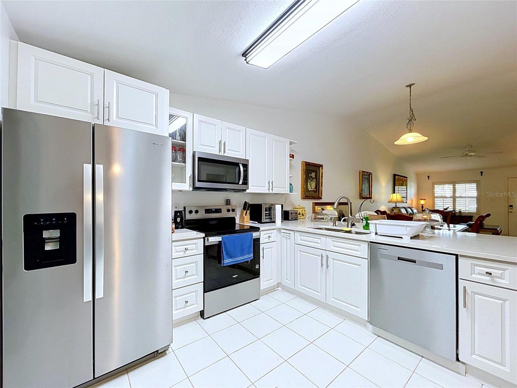 Photo of 1172 Somerset Circle S, Dunedin, FL 34698 (MLS # TB8529523)