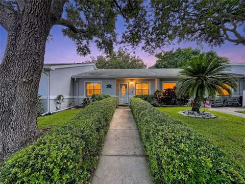 Photo of 1172 Somerset Circle S, Dunedin, FL 34698 (MLS # TB8529523)