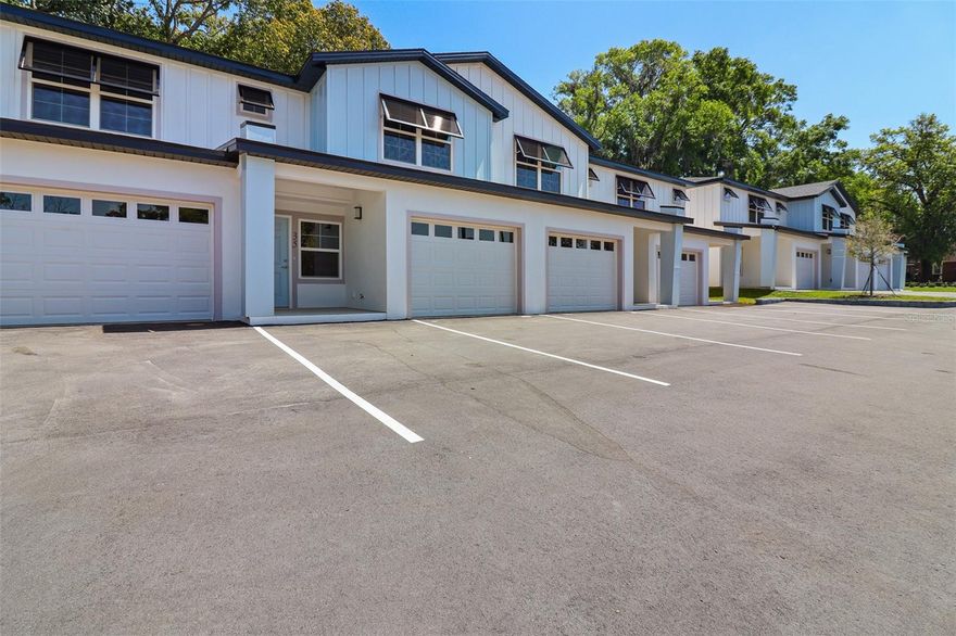 Welcome to this brand new luxury 2 bedroom, 2 full bath, 1 half bath two-story townhome with a 1-car garage in Ocala’s Historic District, just one block off Silver Springs Blvd—placing you right in the heart of it all, including easy access to events like the Ocala Christmas Parade. This newly built home features high-end finishes throughout, including stainless steel appliances and a brand new Samsung front-load washer and dryer in every unit, offering both style and convenience. The layout is thoughtfully designed with a half bath downstairs for guests and comfortable living space upstairs for privacy. Out back, each unit includes a private patio with divider walls, perfect for grilling, relaxing, or unwinding at the end of the day. One of the standout features of this location is the golf cart-friendly access to downtown Ocala, making it easy to enjoy nearby restaurants, coffee shops, boutiques, and local events without ever needing your car. You’re also just minutes from family-friendly spots like Tuscawilla Park, the Discovery Center, and Webb Field, along with everyday conveniences like Publix and Walmart. For added peace of mind, the home is conveniently located near major medical facilities including AdventHealth Ocala and HCA Florida Ocala Hospital. Combining new construction, luxury finishes, and an unbeatable location, this home offers a rare opportunity to live in one of Ocala’s most walkable and vibrant areas.