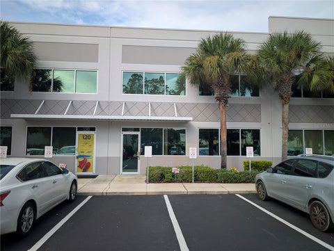 Photo of 6457 Hazeltine National Drive #6, Orlando, FL 32822 (MLS # O6448078)