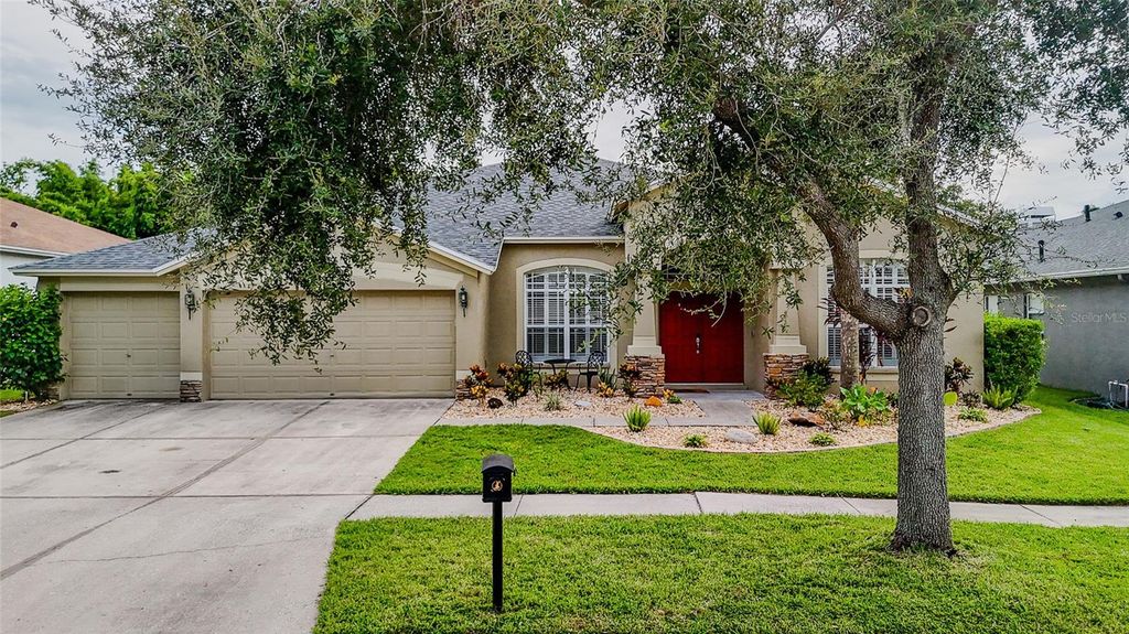 Photo of 16211 Bridgepark Drive, Lithia, FL 33547 (MLS # TB8424025)