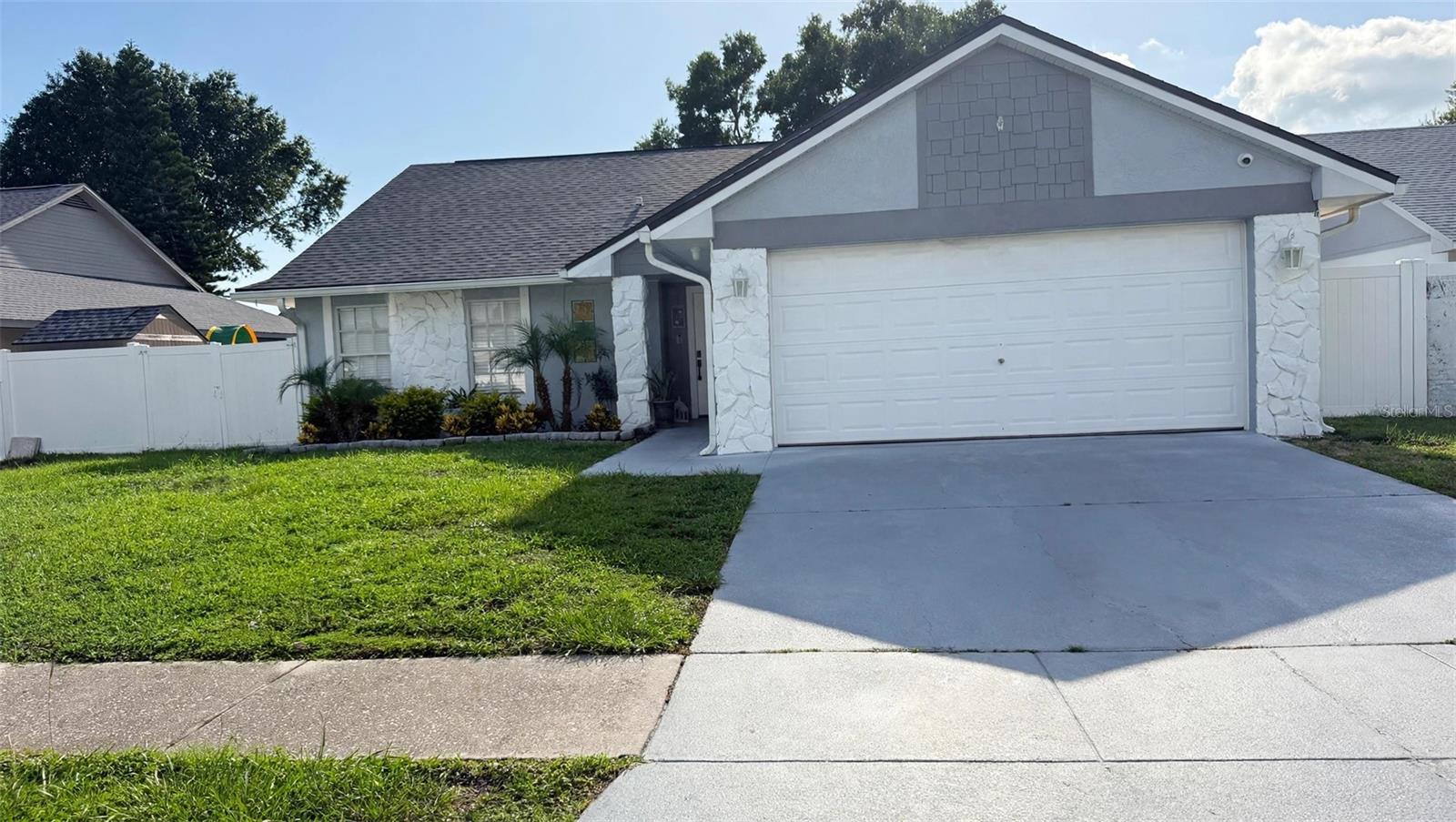 7102 HOLLOWELL DRIVE