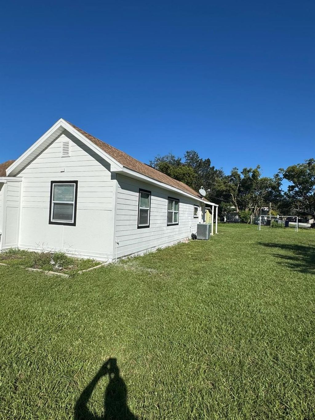 Photo of 1519 Illinois Avenue, Saint Cloud, FL 34769 (MLS # O6320174)