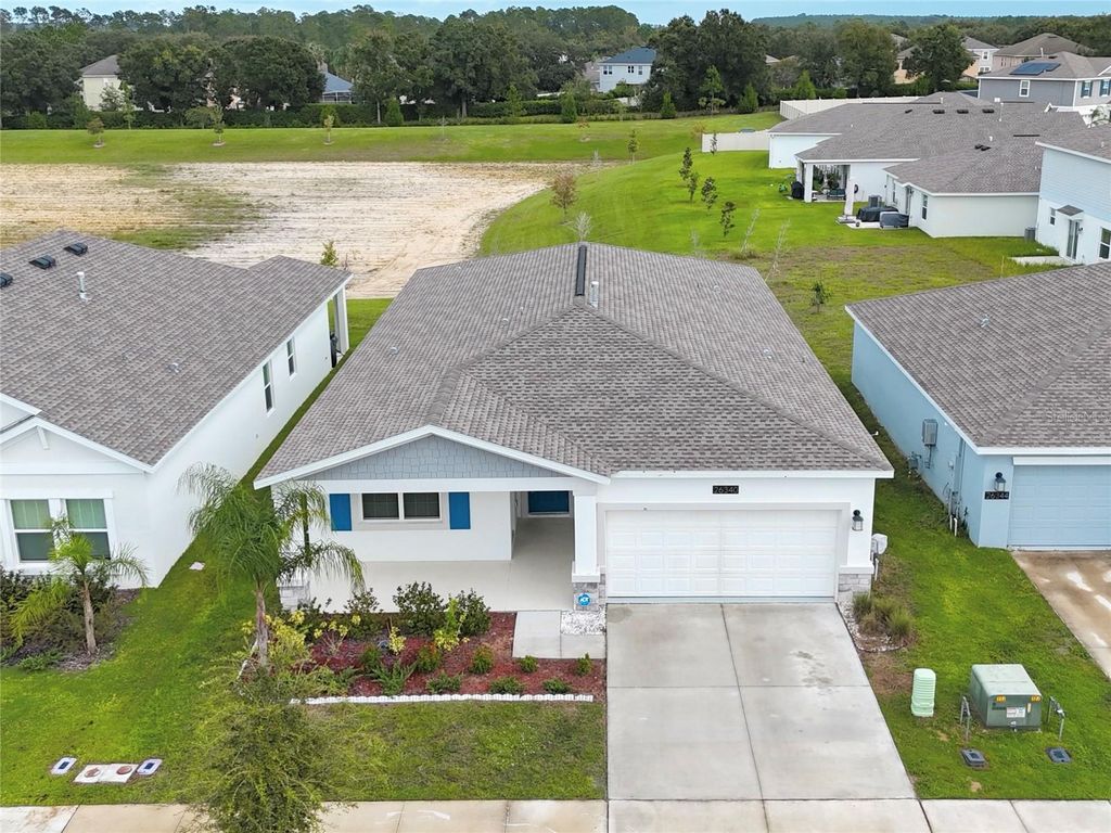 Photo of 26340 Feathergrass Circle, Leesburg, FL 34748 (MLS # O6349900)