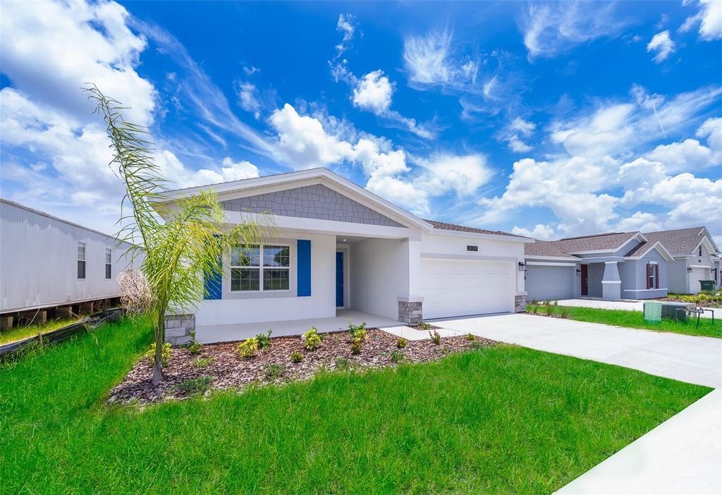 Photo of 26340 Feathergrass Circle, Leesburg, FL 34748 (MLS # O6349900)