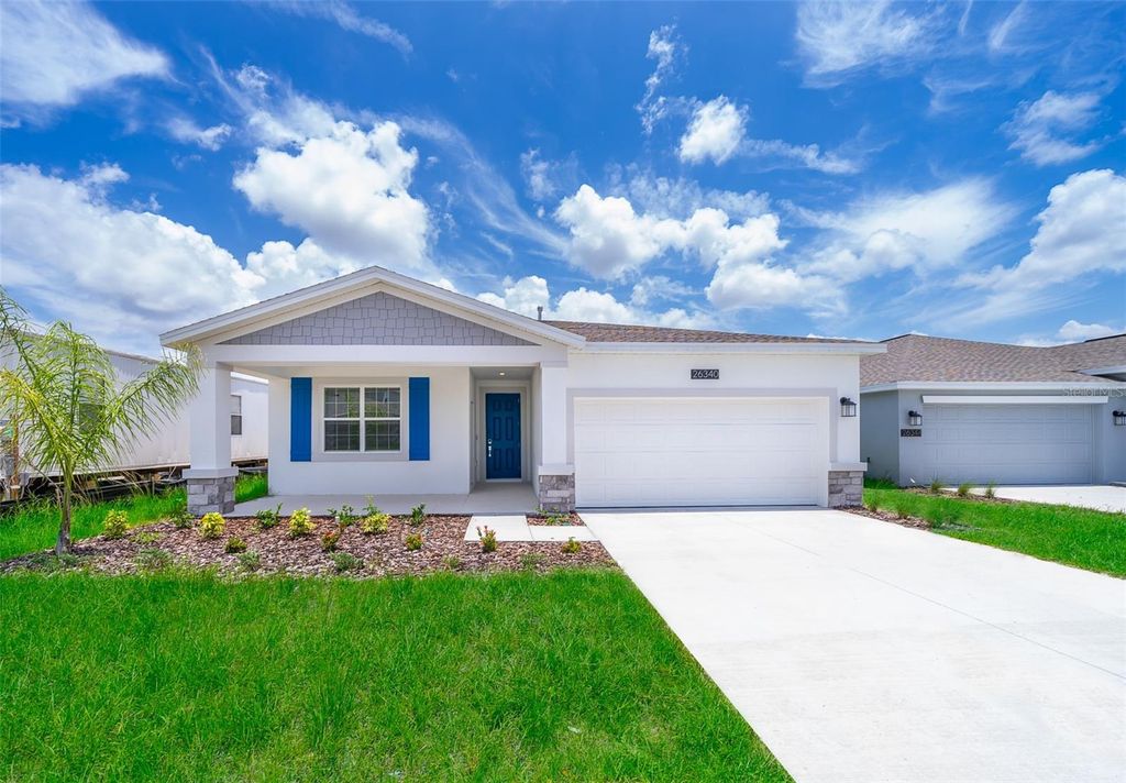 Photo of 26340 Feathergrass Circle, Leesburg, FL 34748 (MLS # O6349900)