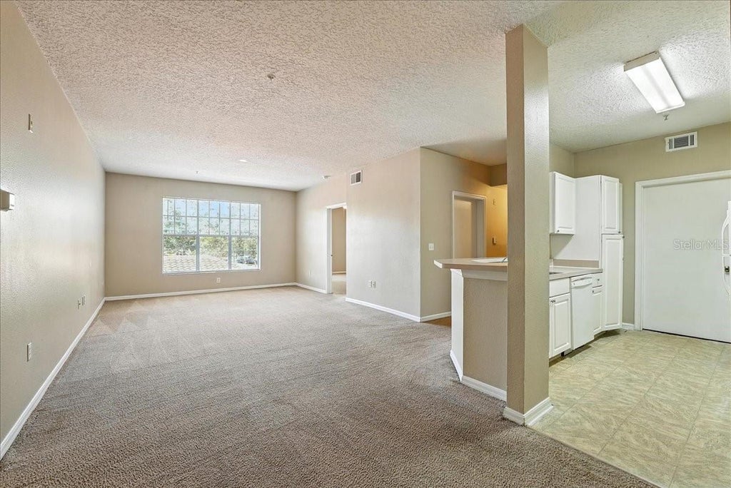 Photo of 5560 Metrowest Boulevard #108, Orlando, FL 32811 (MLS # O6430779)