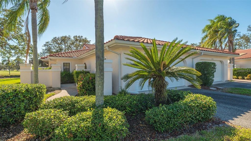 Photo of 7320 Golf Pointe Circle, Sarasota, FL 34243 (MLS # A4666761)