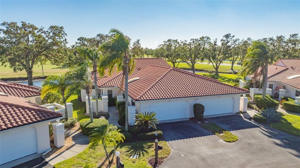 Photo of 7320 Golf Pointe Circle, Sarasota, FL 34243 (MLS # A4666761)