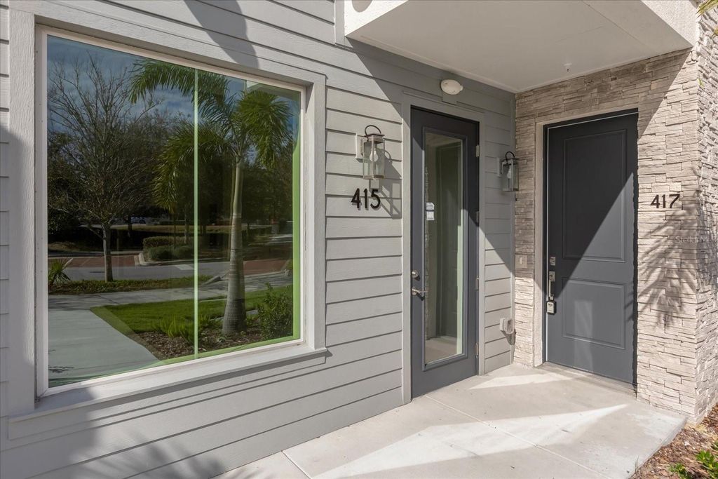 Photo of 415 Mike Roberto Way, Oviedo, FL 32765 (MLS # O6402218)