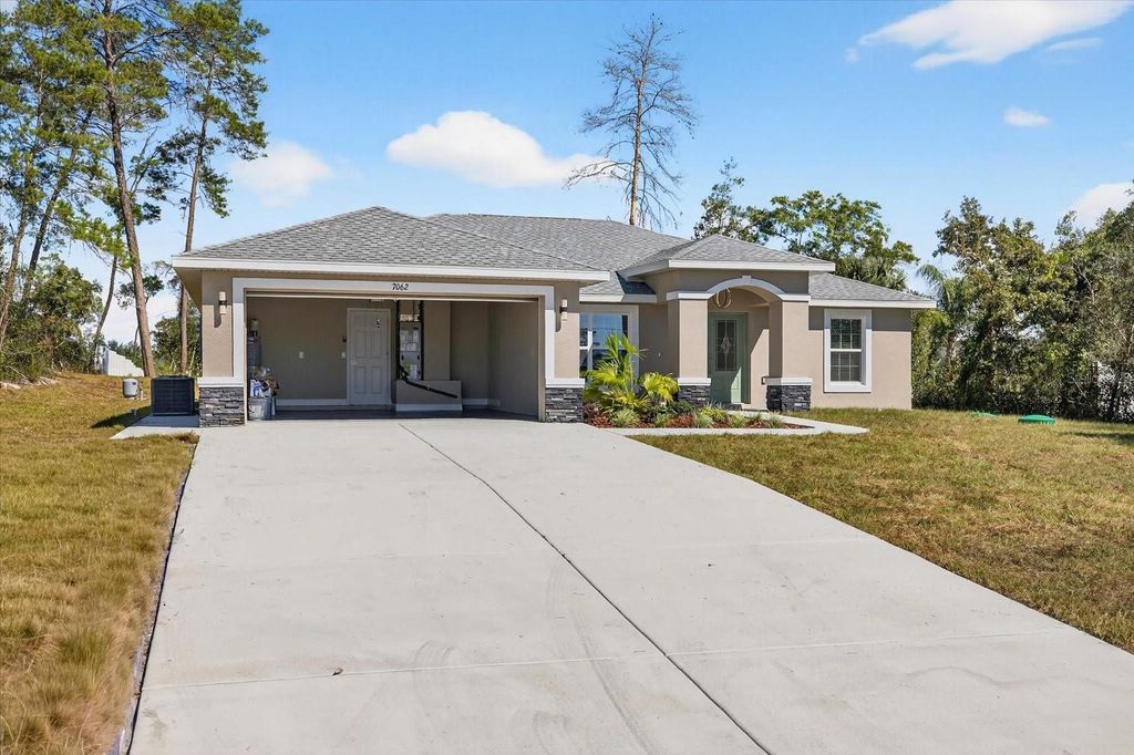 Photo of 7062 Ovenbird Road, Weeki Wachee, FL 34613 (MLS # TB8431690)