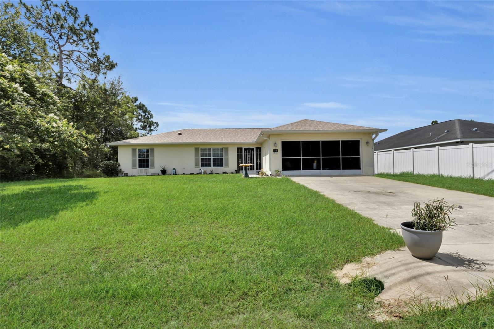Welcome home to this well-maintained 3-bedroom, 2-bathroom POOL home with no HOA! Inside you'll find a functional floor plan and a bright sunroom offering additional flexible living space. Step outside to enjoy your screen-enclosed in-ground pool and spacious backyard with chain-link fencing- perfect for pets or play. The irrigation system helps keep the yard looking great year-round. Major updates include a brand-new roof (2025), A/C (2020), water softener system, and preventive termite protection. The pool is professionally serviced by Pinch A Penny and in great condition. Located in a quiet, established neighborhood with easy access to shopping, dining, and major routes- this home is move-in ready and waiting for you. Schedule your private showing today!