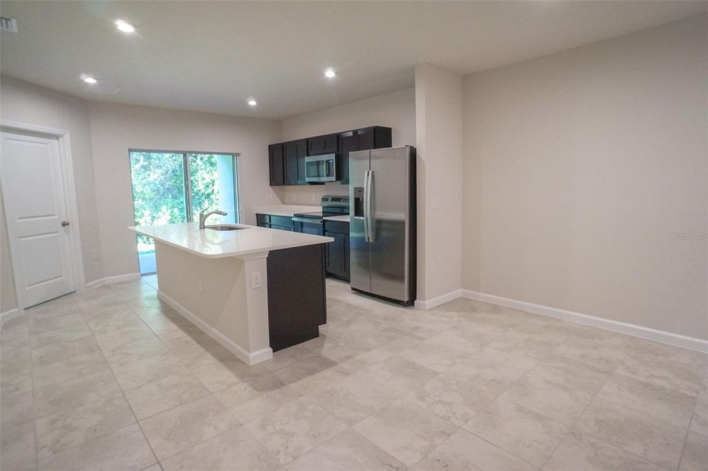 Photo of 12016 Grizzly Lane, New Port Richey, FL 34654 (MLS # TB8441309)