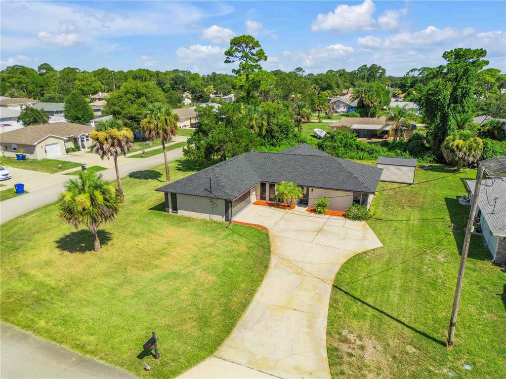 Photo of 117 Poinciana Road, Edgewater, FL 32141 (MLS # NS1088791)