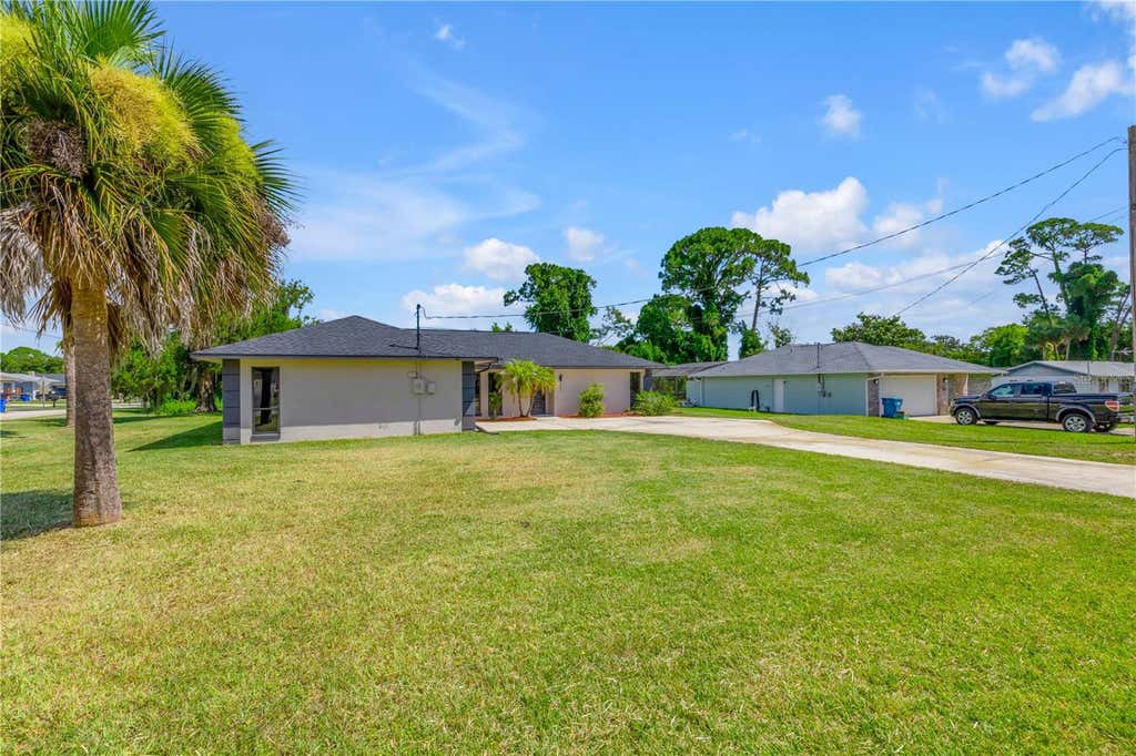 Photo of 117 Poinciana Road, Edgewater, FL 32141 (MLS # NS1088791)