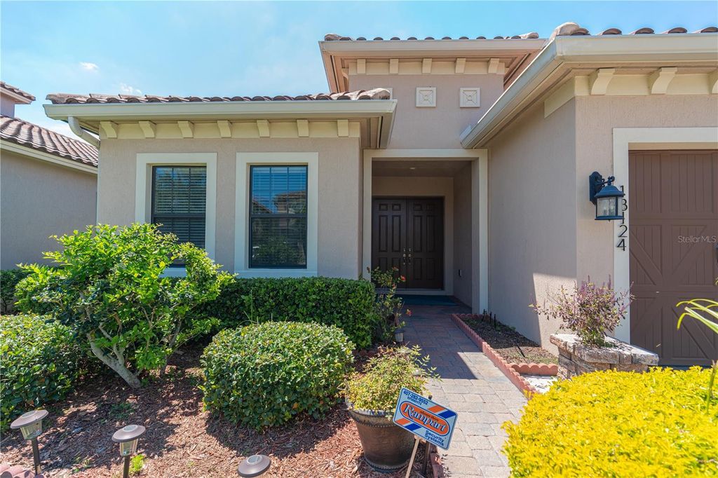 Photo of 13124 Woodford Street, Orlando, FL 32832 (MLS # O6382414)