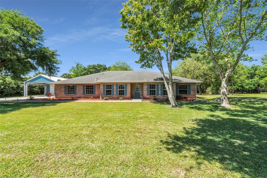 Country living just outside the city! Almost 2 acres of land, making this your Quiet Place in the Country with freedom to bring your toys, tractors and animals. With NO HOA you have the piece of mind to live the way Florida living should be. This 4 bedroom, 2 and 1/2 bath POOL home built of concrete block with a brink exterior with detached 30x50 foot fully insulated toy garage with 2 pole car lift installed. Don't miss out on this oasis conveniently located a short distance from the heart of town, Port orange and New Smyrna. 45 minutes to Orlando via I4 and 1 hour from Jacksonville via 95.
