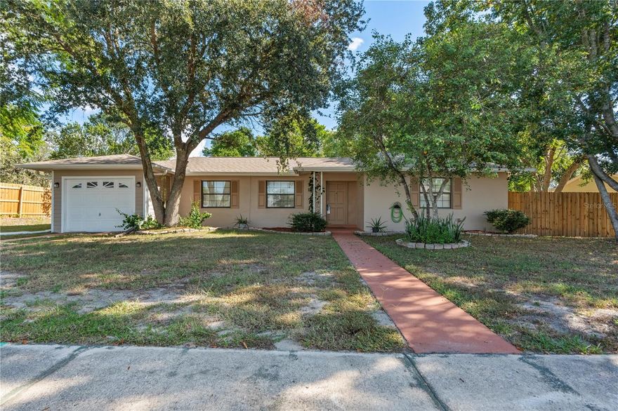 Experience the ultimate Florida living in this beautiful 2 bedroom, 2 bath pool home located on a large fully fenced back yard on a quiet street.  Upon entering the home you will be greeted with an open concept style floor plan that flows to the dining room and kitchen, perfect for large gatherings.  Directly off the kitchen you will find the laundry room with a large storage area.  Leading to the back yard there is a flex space that can be used as a game room, storage, sitting area or home theater.  Both bedrooms and bathrooms are located on the other side of the home.  The bedrooms are ample sized with plenty of natural light.   The back yard has it all.  Image spending your evenings dining on your covered porch and taking an evening swim in your screen enclosed pool. Outside the enclosure you will find a patio fenced on one side for privacy, a storage shed for your lawn equipment and a green house for the gardener in the family. New Roof 2025. Located near shopping, dining, parks and the Suncoast Parkway.  Schedule your private showing today.