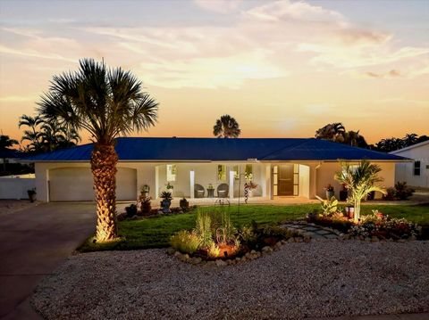 Photo of 617 Dundee Lane, Holmes Beach, FL 34217 (MLS # A4692250)