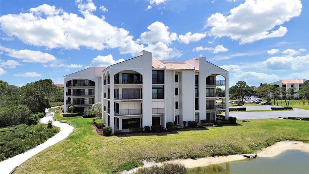 Photo of 203 Mariner Drive #203, Tarpon Springs, FL 34689 (MLS # TB8440499)