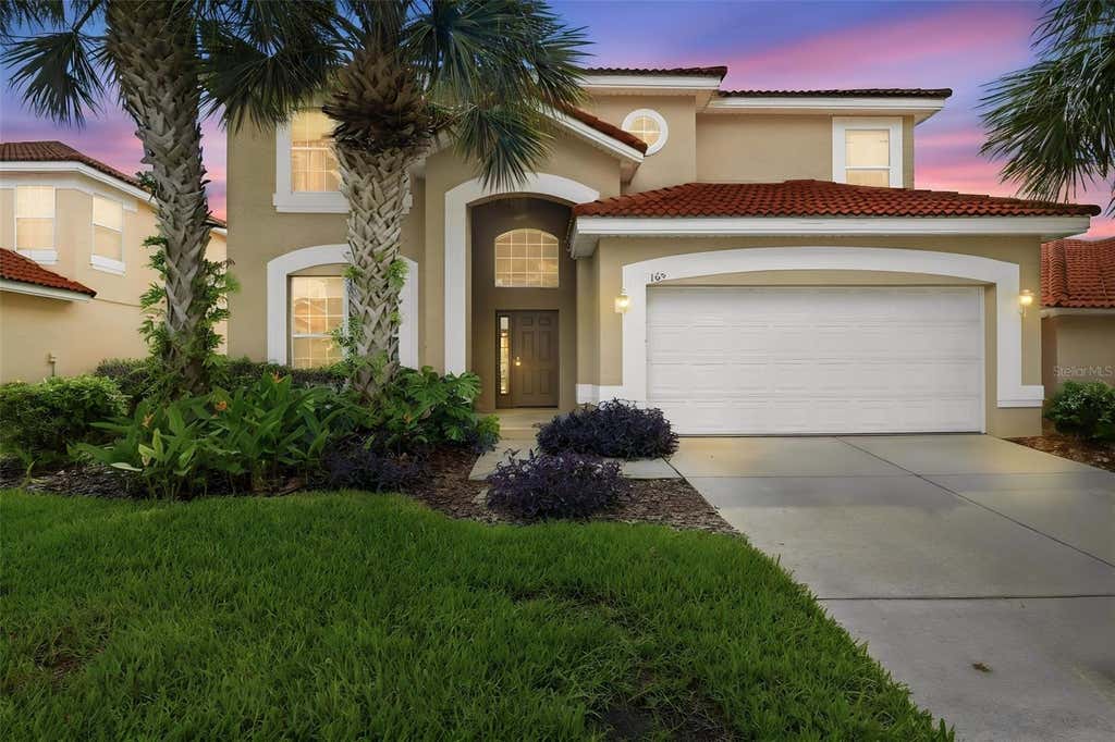 Photo of 165 Sevilla Avenue, Davenport, FL 33897 (MLS # O6434100)